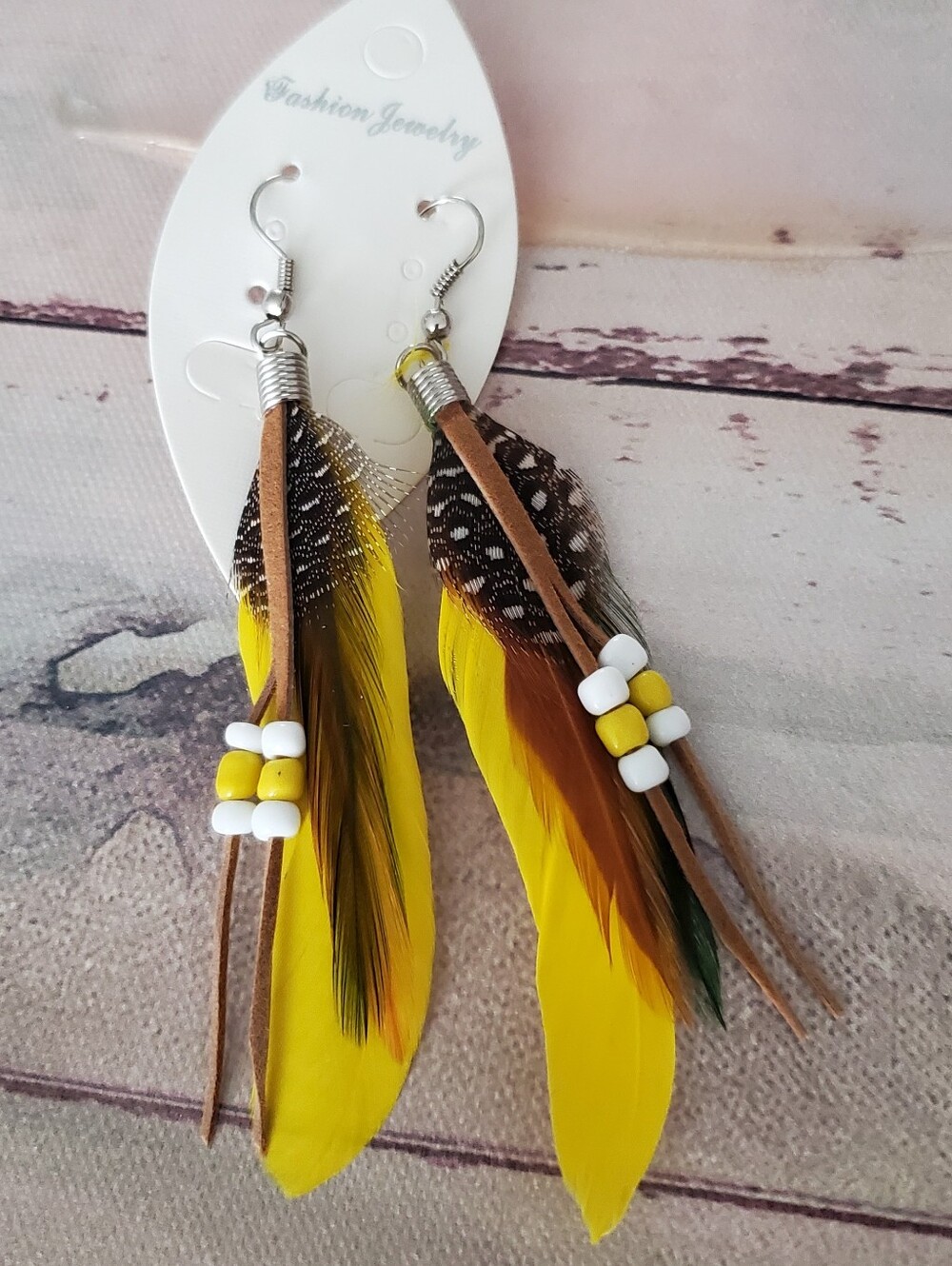Long Light Layered Yellow Feather Dangle Earrings.